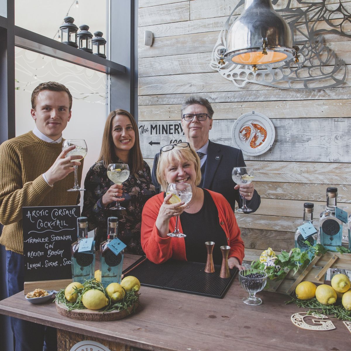 Team members attend the Gin Launch