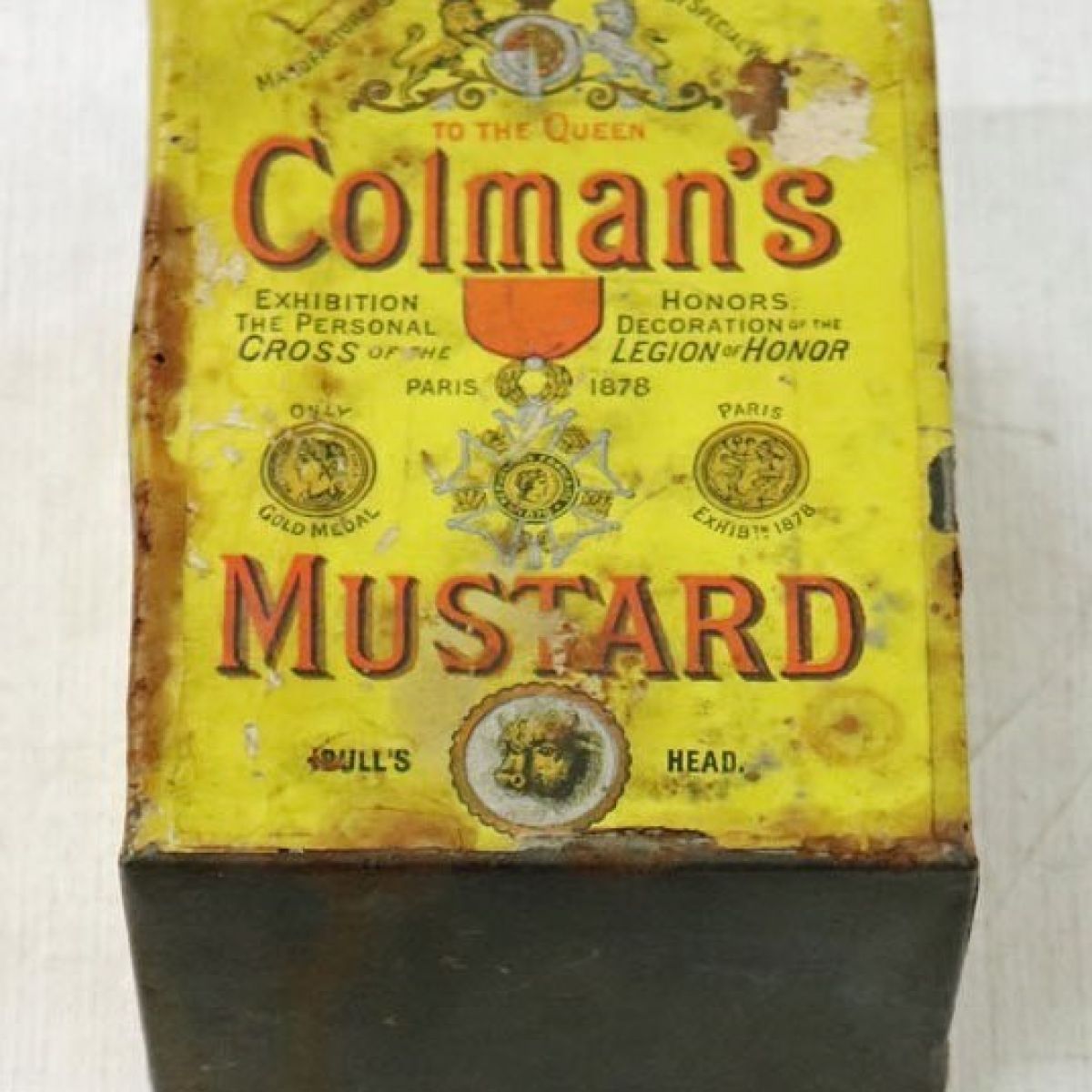 A Colman's mustard tin after receiving treatment