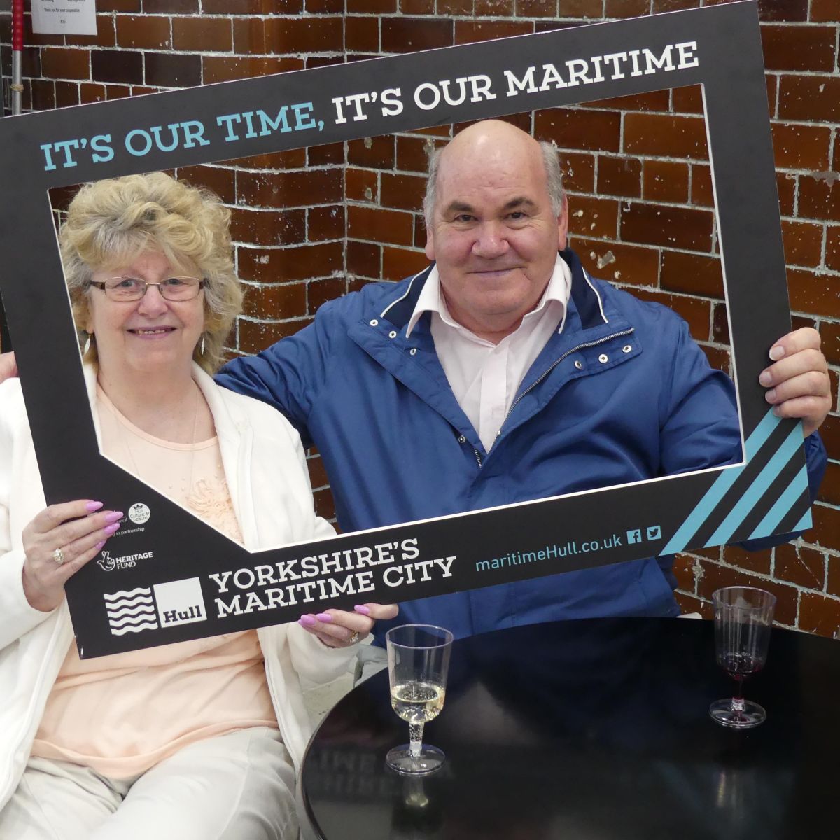 Project supporters pose in the maritime selfie frame