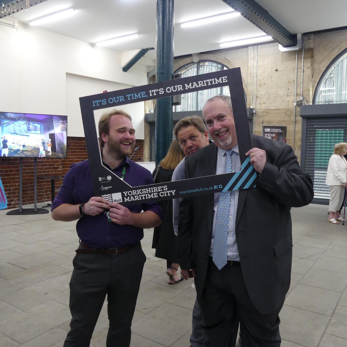 Cultural Services Director appears in the maritime selfie frame at Exhibition Launch